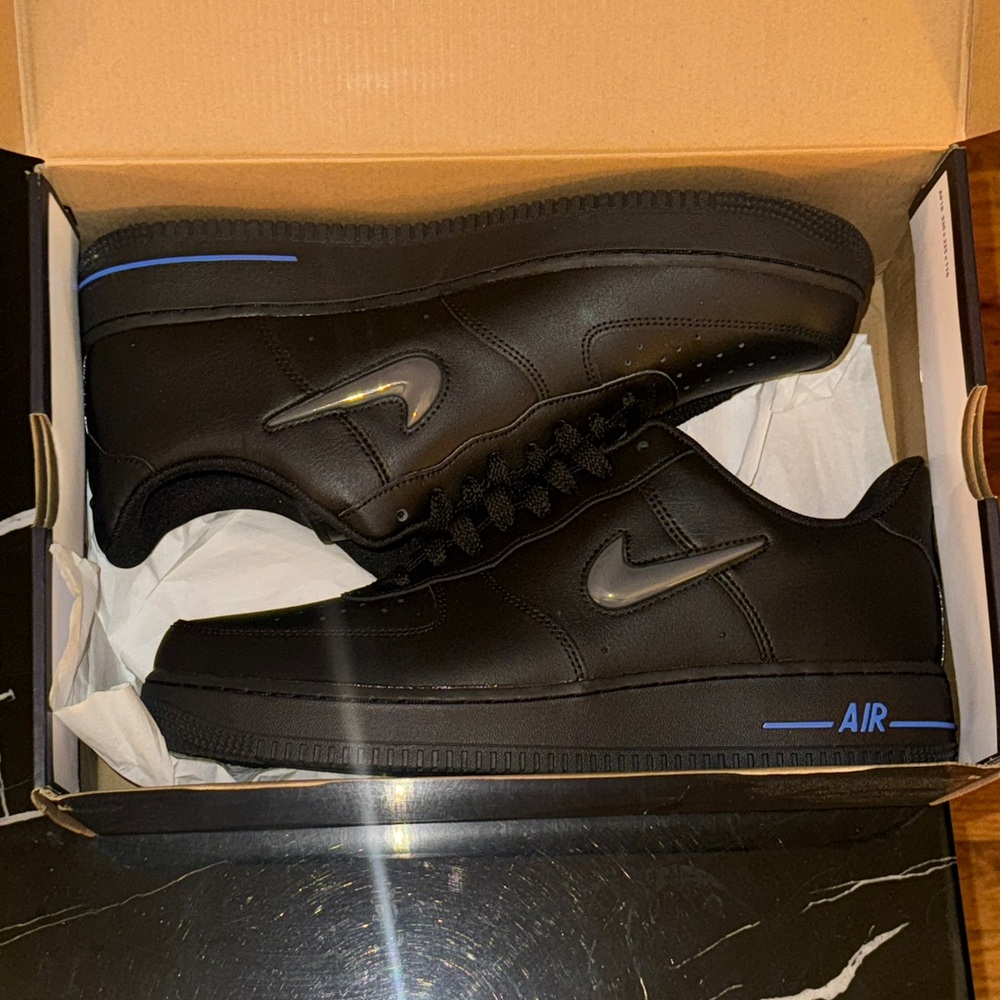 Nike Air Black Sneakers with Blue Highlights